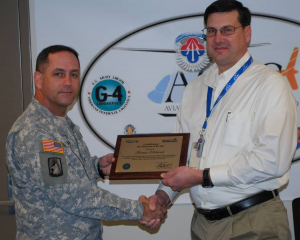 Elsbernd Receives Award from Col. Michael Aid