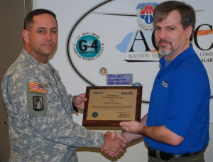 Gerebis Receives Award from Col. Michael Aid