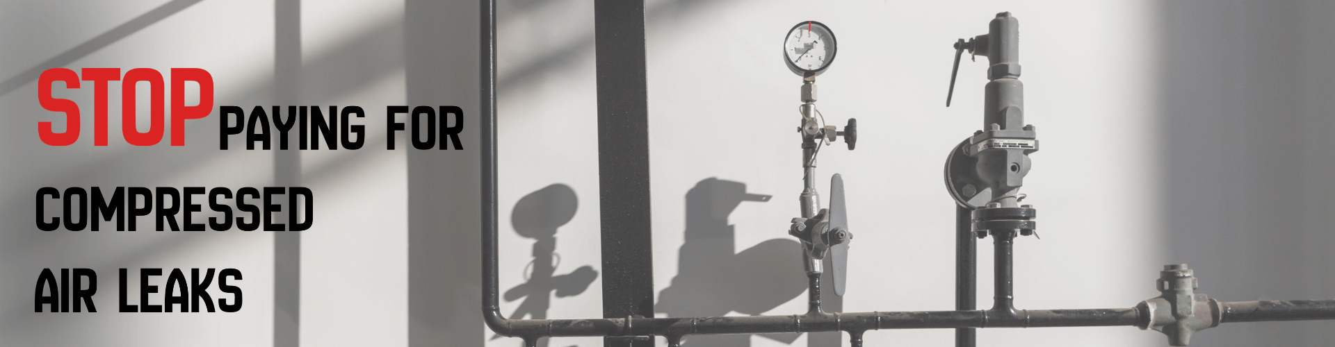 gray background with black air pipes with shadow and air pressure gauge