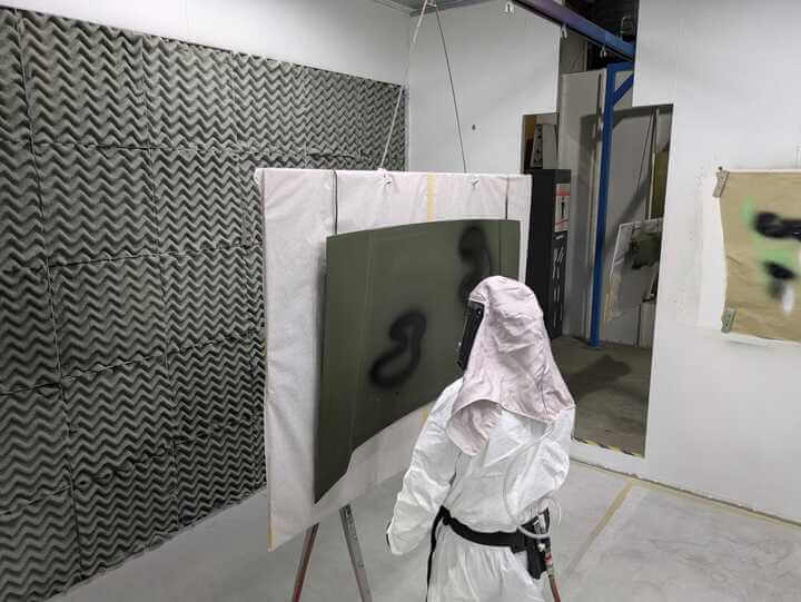Hands-on training in painting booth