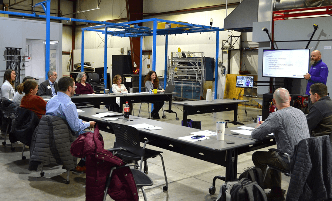 IWRC Advisory Committee members meet at the painter training PACE facility.